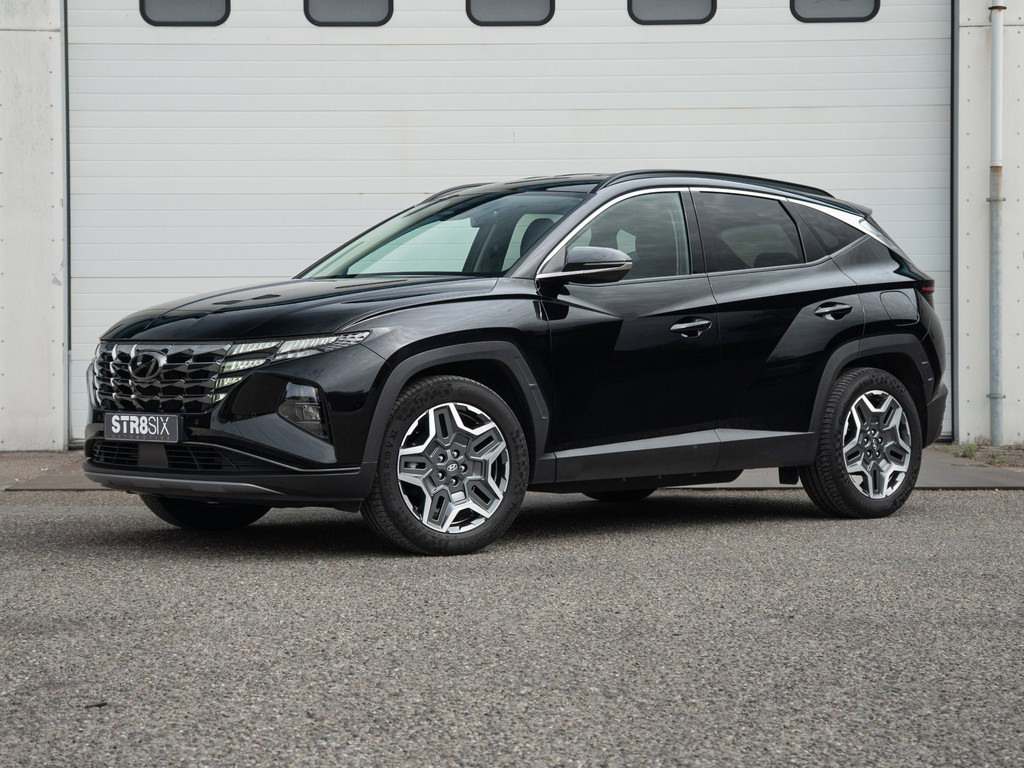 Hyundai Tucson 1.6 T-GDI (2021) 265 PK PHEV Comfort 4WD | Navi Full Map | Verwarm. stoelen + stuurwiel | PDC + camera | Dakrails 53165068-0.jpg | STR8SiX Automotive